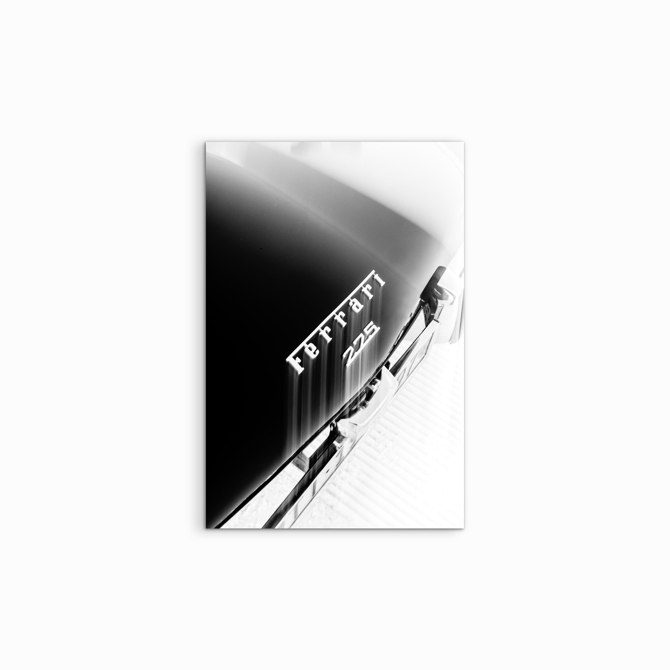 The Ferrari 275 is a masterpiece of curves, but on the frozen expanse of Lake St. Moritz, it becomes a study in stark, crystalline geometry. This high-contrast shot strips away the distraction of the car's legendary racing red, leaning instead into the "Hero Below Zero" atmosphere of The I.C.E. 2026.
By focusing on the classic silver emblem, the image tells a story of enduring craftsmanship meeting a fleeting, frozen moment in time.